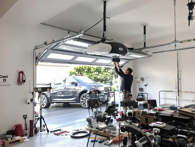 Redondo Beach Garage Door Repair specialist installing smart garage door opener system in Redondo Beach home