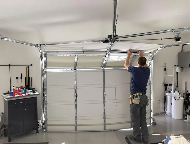 Redondo Beach Garage Door Repair specialist performing precise section replacement on Redondo Beach garage door